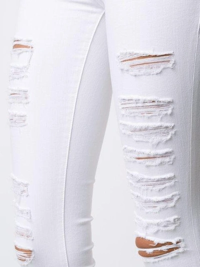 Shop Frame Distressed Skinny Cropped Jeans In White