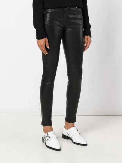 Shop Givenchy Skinny Leather Trousers - Black