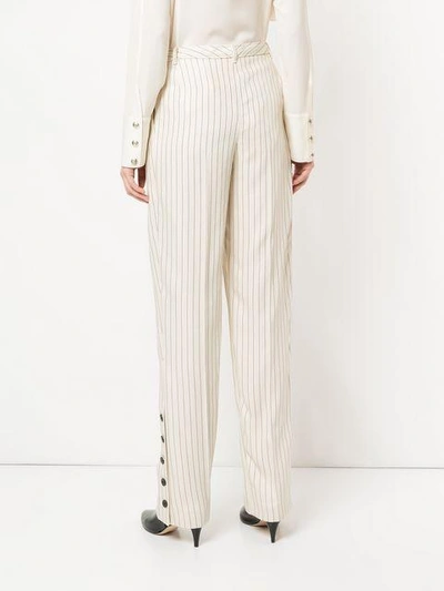 Shop Altuzarra Striped Button Cuff Trousers In White