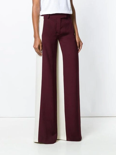 Shop Valentino Colour Block Palazzo Pants In Red