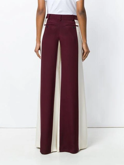 Shop Valentino Colour Block Palazzo Pants In Red