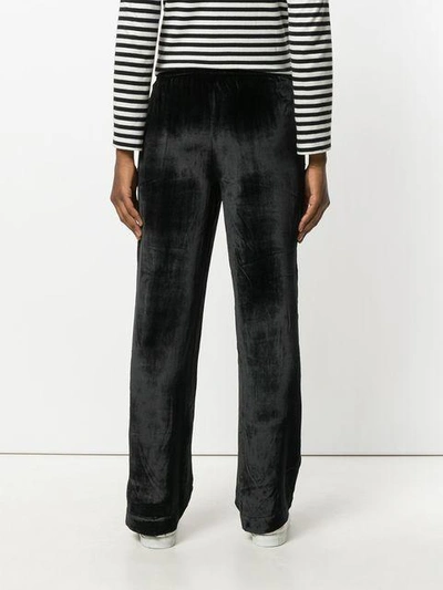 Shop J Brand Velvety Track Pants In Black