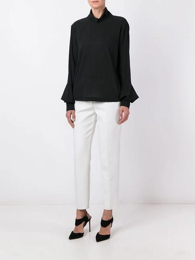 roll-neck blouse