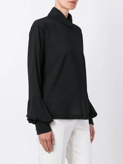 roll-neck blouse
