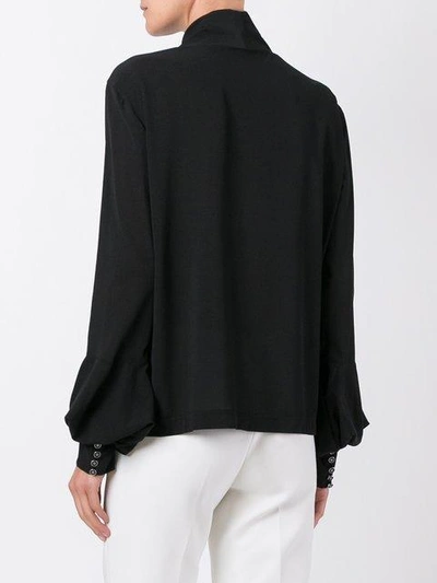 roll-neck blouse