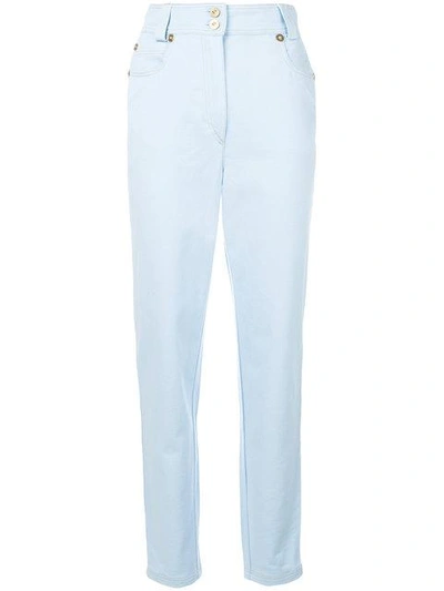 Shop Versace Tapered Jeans In A8432-light Blue