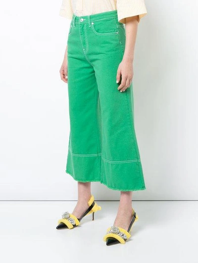 Shop Msgm Cropped Flared Jeans