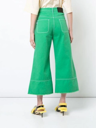 Shop Msgm Cropped Flared Jeans
