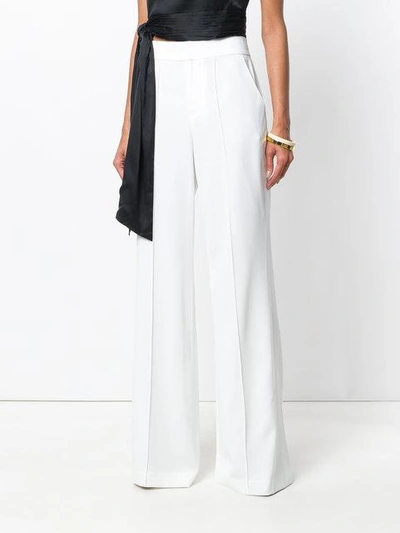 Shop Alice And Olivia Alice+olivia Flared High-waisted Trousers - White