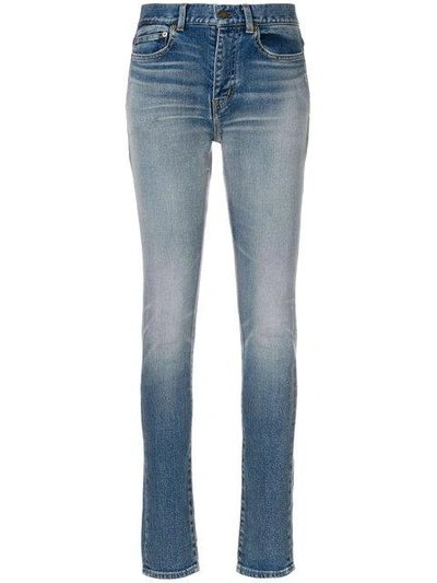 Shop Saint Laurent Faded Skinny Jeans In Blue