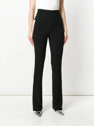 Shop Norma Kamali Side Stripe Flared Trousers - Black