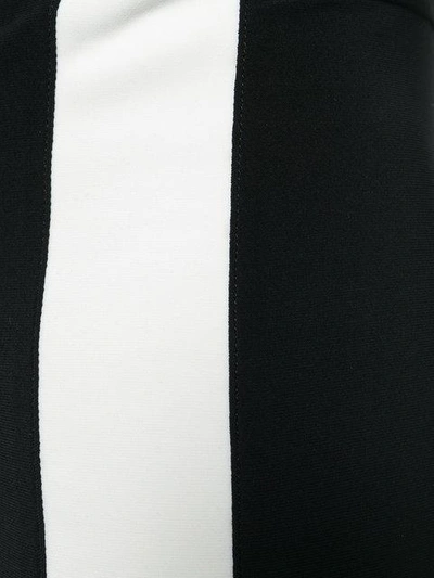 Shop Norma Kamali Side Stripe Flared Trousers - Black