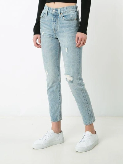 Shop Levi's Ripped Cropped Skinny Jeans In Blue