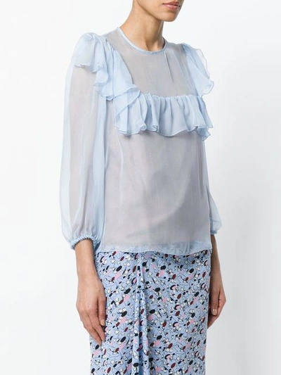 ruffled blouse