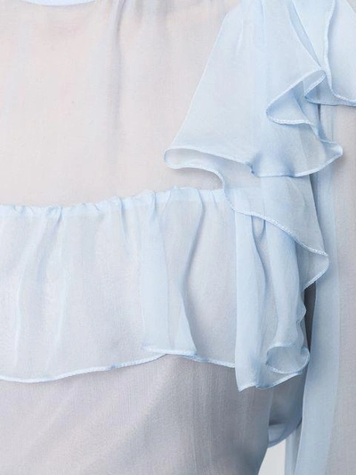 ruffled blouse