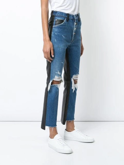 Shop Amiri Cropped Flared Jeans In Blue