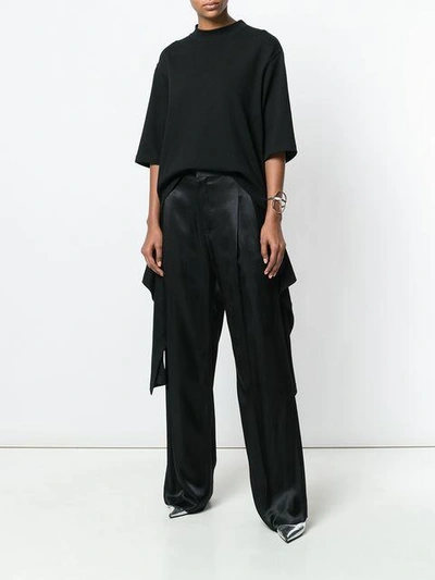Shop Givenchy High-waisted Flared Trousers - Black