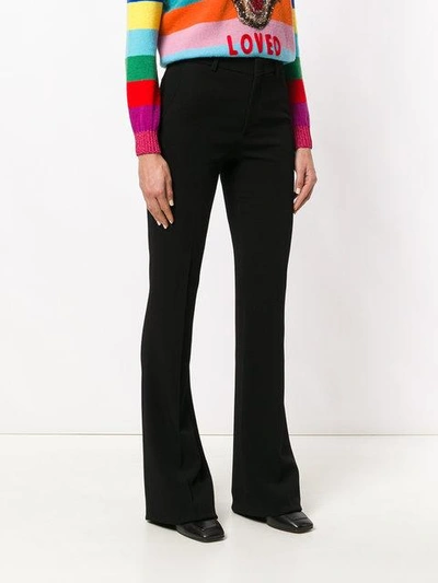 Shop Gucci Flared Trousers In 1000 Black