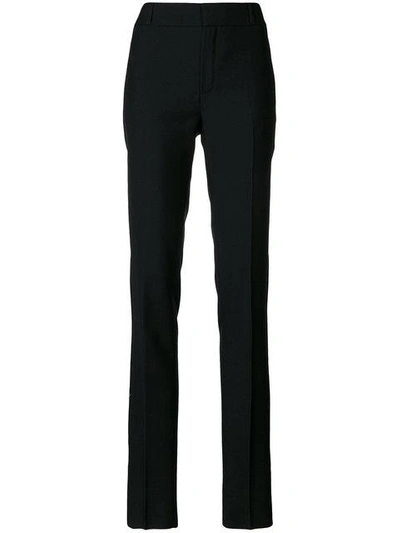 Shop Saint Laurent High-waisted Tapered Trousers In Black