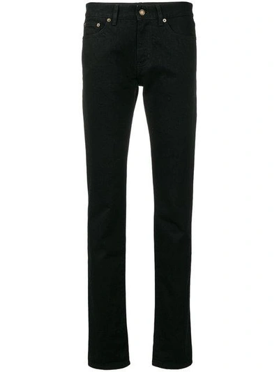 Shop Saint Laurent Mid Rise Skinny Jeans In Black