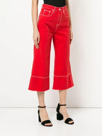 Shop Msgm Cropped Flare Jeans - Red