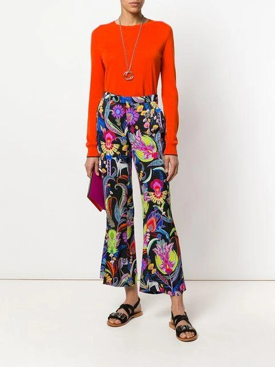Shop Etro Mixed Floral Print Flared Trousers - Multicolour
