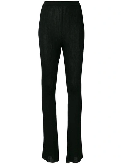 Shop Givenchy Flared Ribbed Trousers - Black