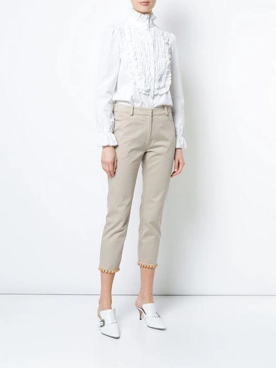 Shop Rosie Assoulin Cropped Beaded Trim Trousers - Neutrals