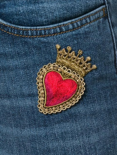 Shop Dolce & Gabbana Skinny Jeans With Sacred Heart Patch In Blue
