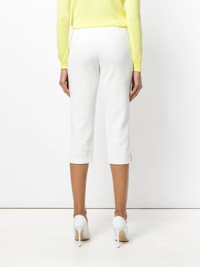 Shop Boutique Moschino Cropped Trousers In White