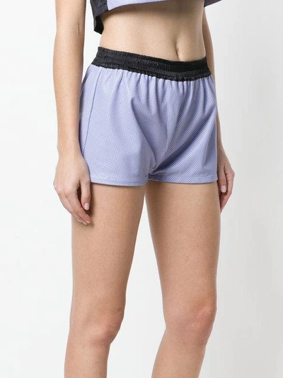 Shop Coup De Coeur Perforated Shorts - Purple