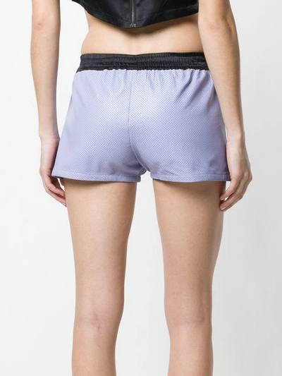 Shop Coup De Coeur Perforated Shorts - Purple