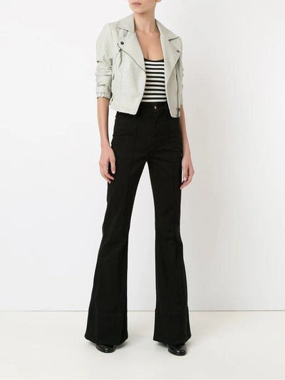 Shop Amapô High Waist Flared Jeans In Black