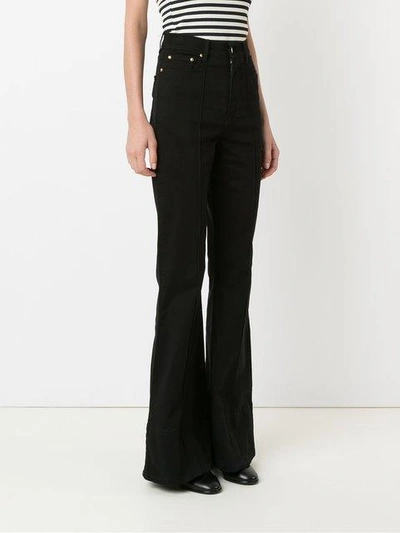 Shop Amapô High Waist Flared Jeans In Black