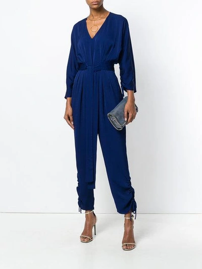 Shop Stella Mccartney Plunge Neck Jumpsuit In Blue