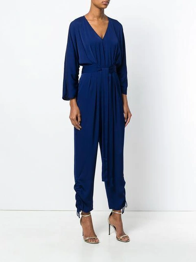 Shop Stella Mccartney Plunge Neck Jumpsuit In Blue