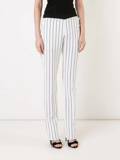 Shop Mugler Pinstripe Trousers In Black