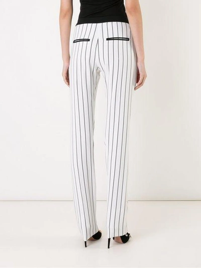 Shop Mugler Pinstripe Trousers In Black