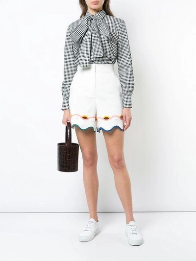 Shop Sara Battaglia Wavy Hem Shorts In White