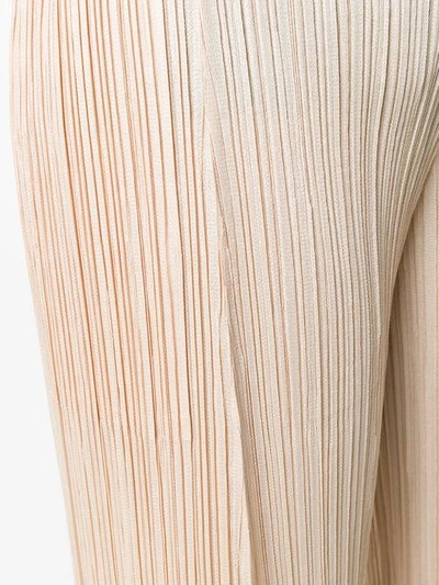 Shop Issey Miyake Micro-pleated Trousers In Neutrals