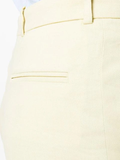 Shop Joseph Flared High-waisted Trousers In Yellow
