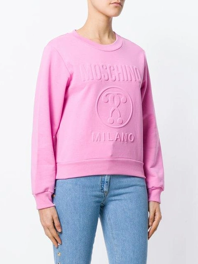 Shop Moschino Embossed Sweatshirt - Pink & Purple