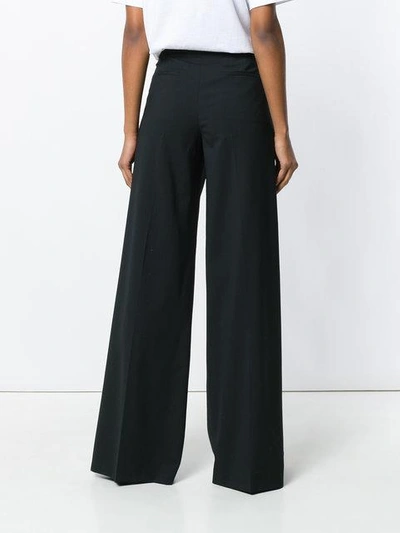 Shop Red Valentino Side Stud Trousers In Black