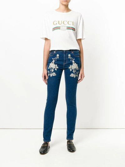 Shop Gucci Embroidered Skinny Jeans In Blue