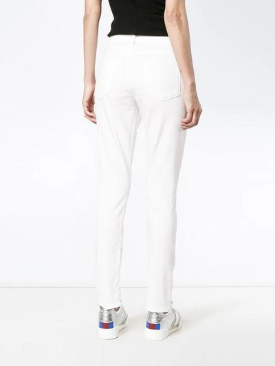 Shop Frame Le Garcon White Mid Rise Skinny Jeans