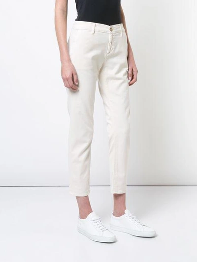 Shop Ag Caden Skinny Trousers In Neutrals