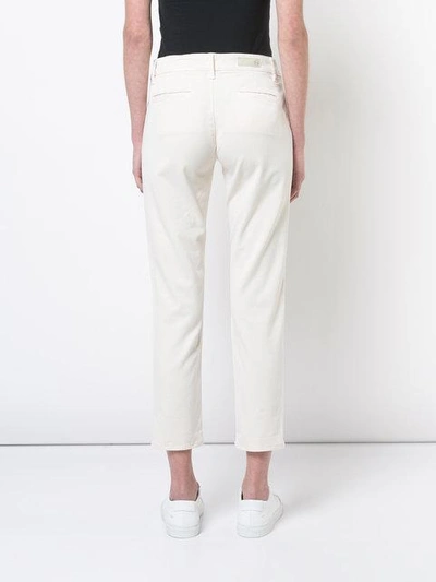Shop Ag Caden Skinny Trousers In Neutrals