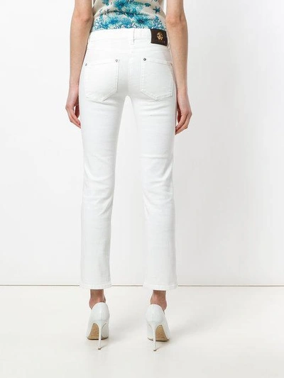Shop Roberto Cavalli Slim Fit Jeans In White