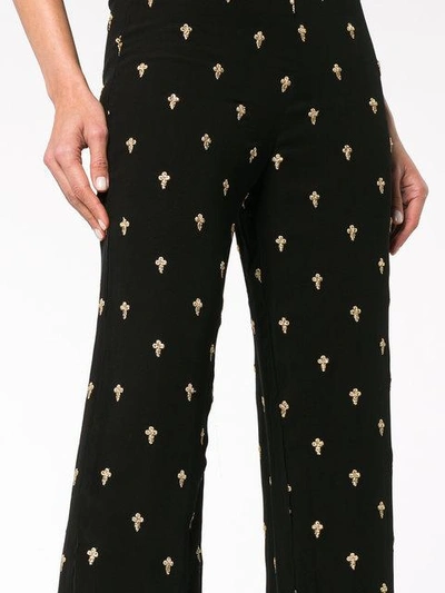 Shop De La Vali Uma Trousers With Gold Cross Embroidery In Black