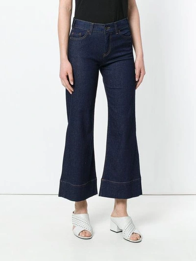 Shop Emporio Armani Cropped Flared Jeans - Blue